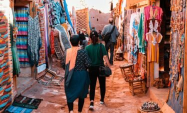 people walking on market during daytime